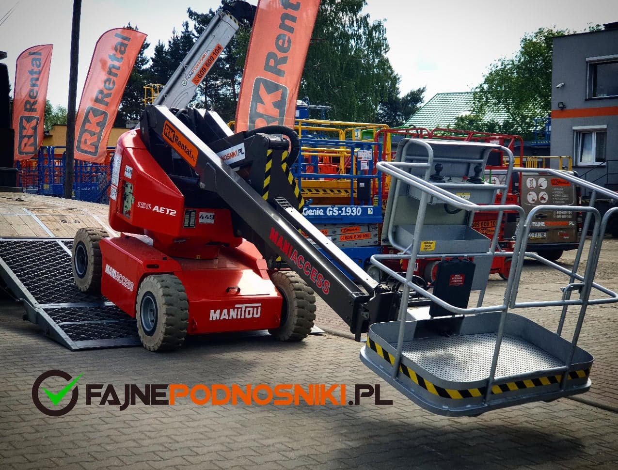 Podnośnik przegubowy elektryczny Manitou 150 AET2 (15 m) na naczepie RK Rental przed dostawą do klienta