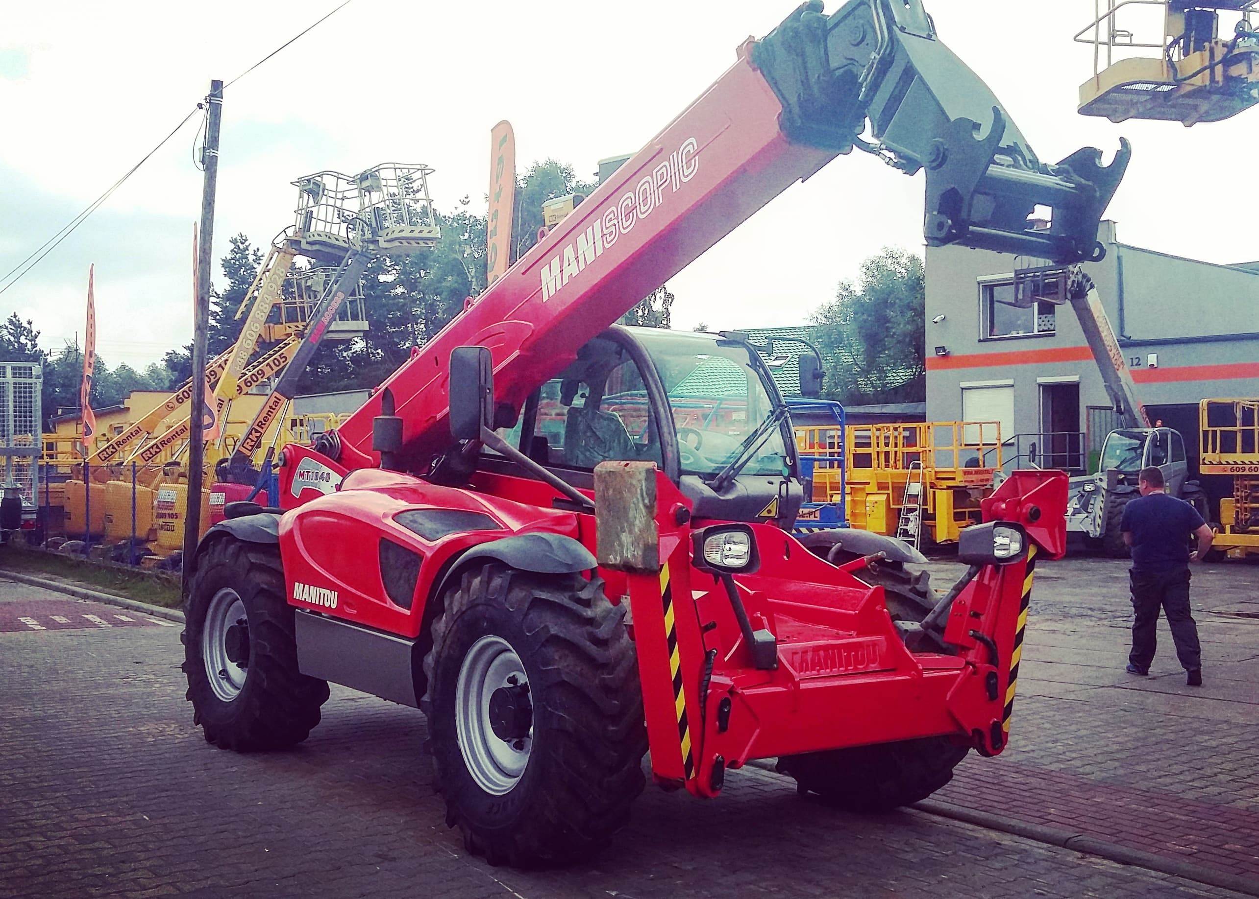 Manitou MT 1840 Privilege telehandler (18 m, 4 t capacity, 4×4) at the RK Rental base in Brzoza before delivery to a customer in Toruń