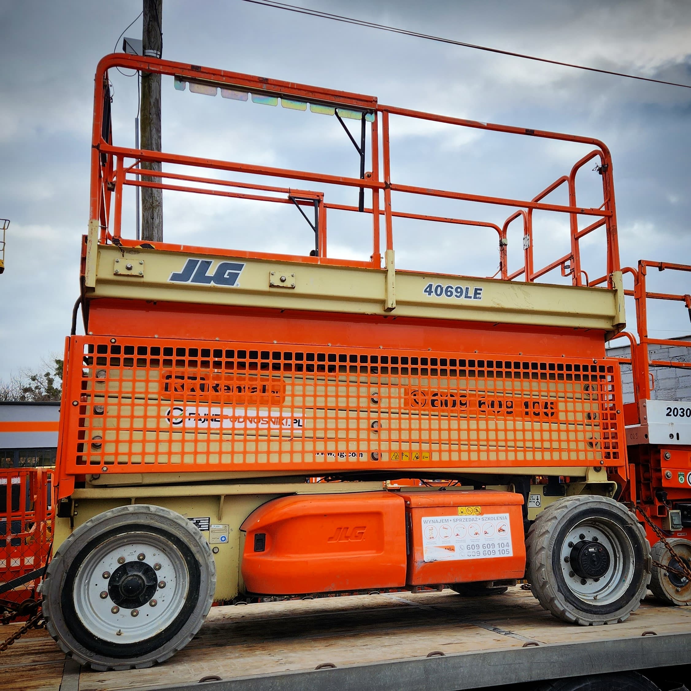 JLG 4069LE electric rough terrain scissor lift (14.2 m) from RK Rental in Żnin